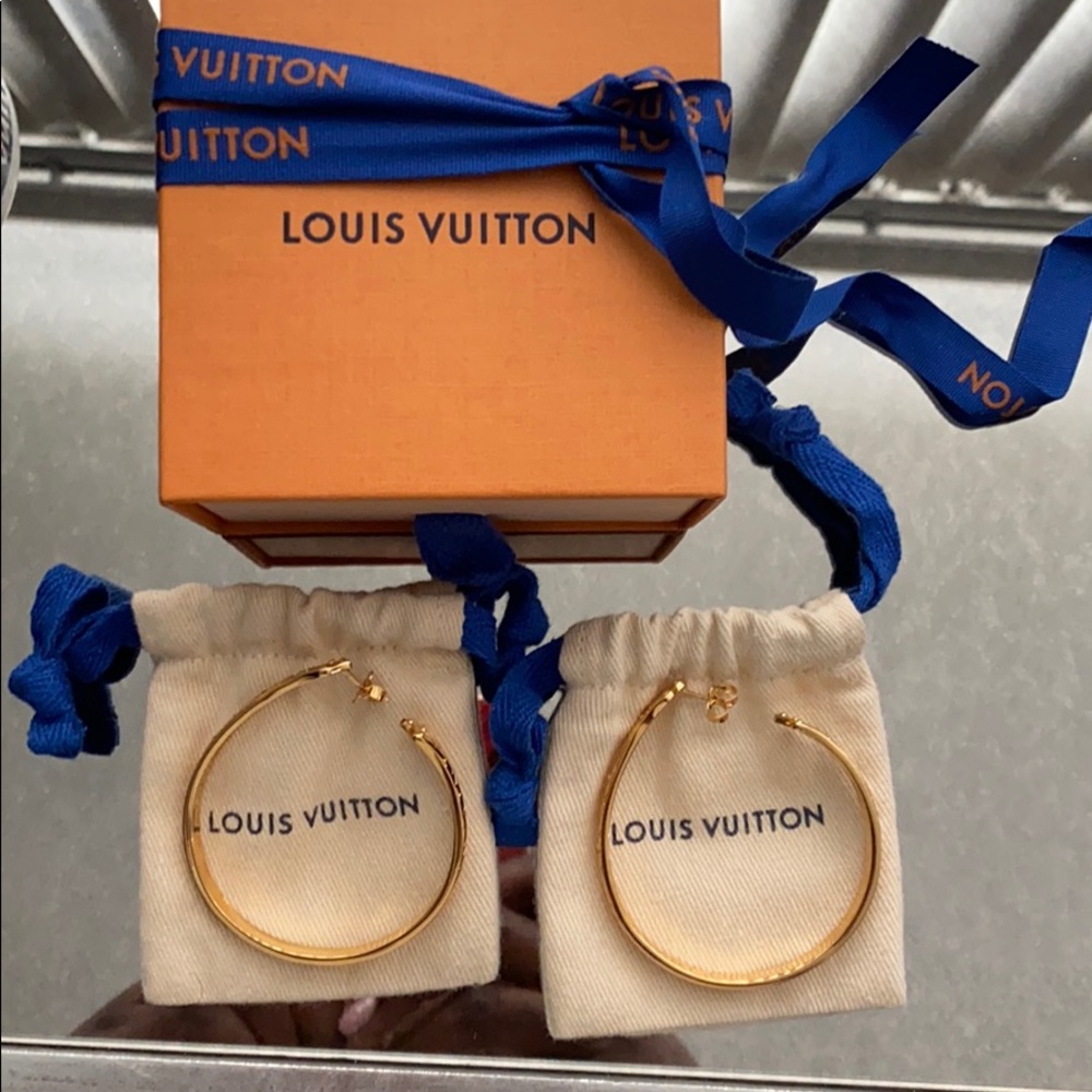 Louis Vuitton earrings. Price is firm. Months old.
